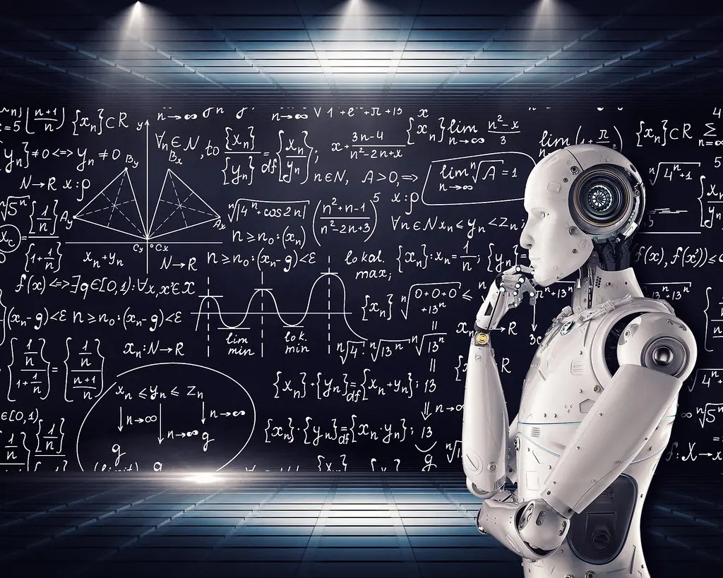 A humanoid robot in a thinking pose before a blackboard covered in mathematical formulas